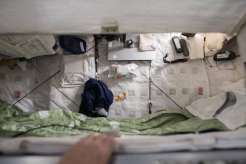 View inside the crew quarters where astronauts sleep on the ISS