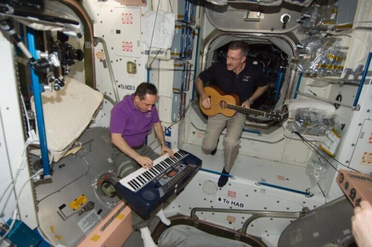 Astronauts playing instruments on the international space station