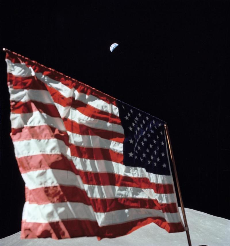 Flag On Moon WIth Earth In Background