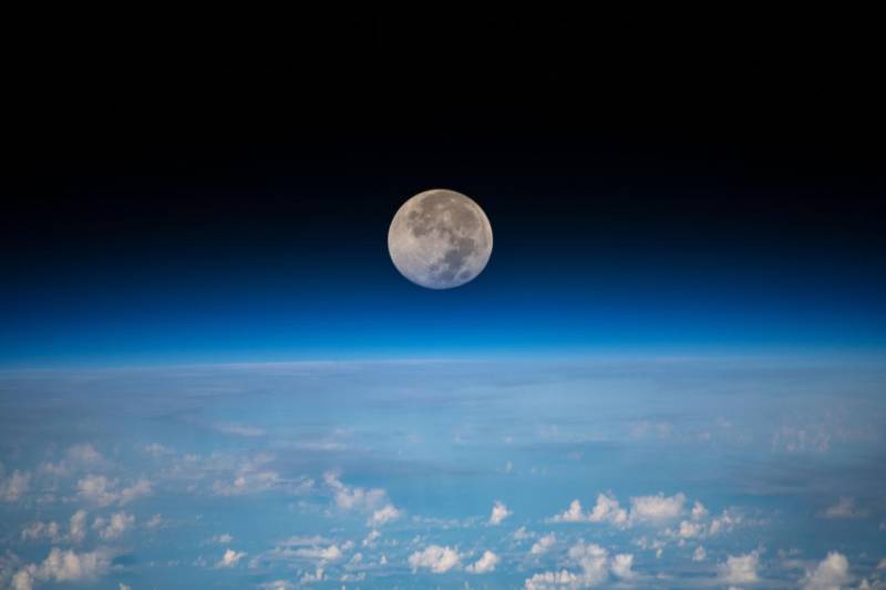 Moon Above The Ocean