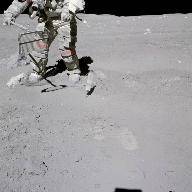 Astronaut Collecting Samples On The Moon